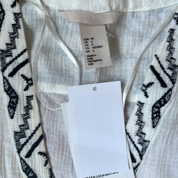 Embroidered dress - Picture 2 of 4